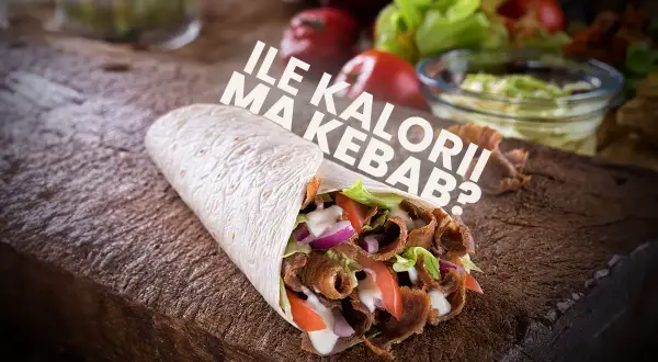 Pyszny kebab z mięsem, warzywami i sosem. Zastanawiasz się, ile kalorii ma kebab?